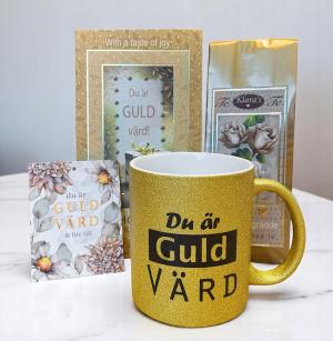 Presentset Du är guld värd (mugg, praliner, te och kort)